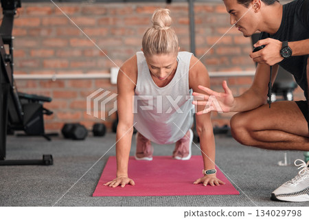 Fitness, push up and people, personal trainer or woman in gym coaching for support, performance check and muscle goals. Athlete, sports person in strong workout, exercise motivation or training timer Fitness, push up and people, personal trainer or woman in gym coaching for support, performance check and muscle goals. Athlete, sports person in strong workout, exercise motivation or training timer 134029798