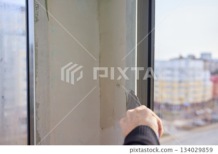 The Wall Repair Process Involves Properly Using Spackling Paste for a Quality Finish The Wall Repair Process Involves Properly Using Spackling Paste for a Quality Finish 134029859