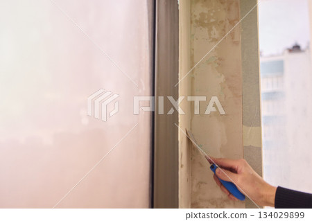 The Wall Repair Process Involves Properly Using Spackling Paste for a Quality Finish The Wall Repair Process Involves Properly Using Spackling Paste for a Quality Finish 134029899