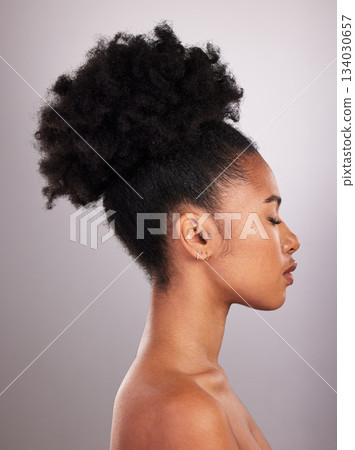 Skincare, makeup and profile of black woman with confidence, white background and cosmetics product. Health, dermatology and natural beauty, African model in studio for healthy skin care and wellness Skincare, makeup and profile of black woman with confidence, white background and cosmetics product. Health, dermatology and natural beauty, African model in studio for healthy skin care and wellness 134030657
