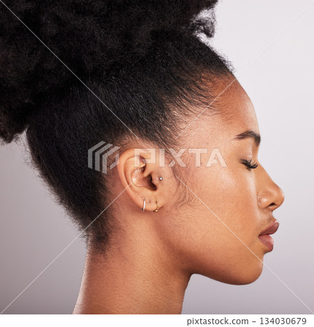 Skincare, beauty and profile of black woman with confidence, white background and cosmetics product. Health, dermatology and natural makeup, African model in studio for healthy skin care and wellness Skincare, beauty and profile of black woman with confidence, white background and cosmetics product. Health, dermatology and natural makeup, African model in studio for healthy skin care and wellness 134030679