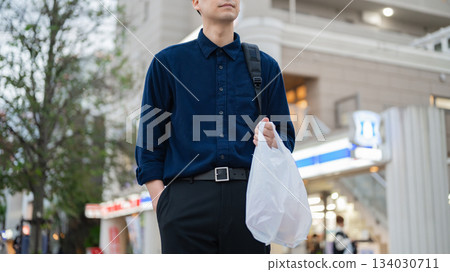 A man walking in the city A man walking in the city 134030711