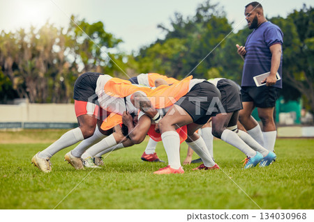 Rugby, scrum or men training with coach on grass field ready for match, practice or sports game. Fitness, performance or strong athletes in tackle for warm up, exercise and workout for a competition Rugby, scrum or men training with coach on grass field ready for match, practice or sports game. Fitness, performance or strong athletes in tackle for warm up, exercise and workout for a competition 134030968