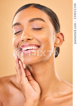 Makeup, beauty and face or smile of woman in studio for skincare, cosmetics and dermatology. Aesthetic female .hand for self care, natural skin and spa facial shine results on a brown background Makeup, beauty and face or smile of woman in studio for skincare, cosmetics and dermatology. Aesthetic female .hand for self care, natural skin and spa facial shine results on a brown background 134031149