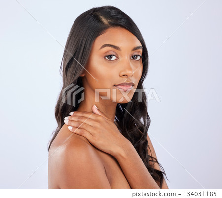 Indian woman, hair or beauty in studio portrait for growth, healthy natural shine or grooming wellness. Face of glowing young girl model, salon spa mockup or self care cosmetics on white background 134031185