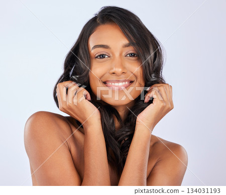 Woman, portrait smile and curly hair for salon treatment, keratin or self care against white studio background. Happy isolated female model smiling for healthy hairstyle, haircare or beauty cosmetics Woman, portrait smile and curly hair for salon treatment, keratin or self care against white studio background. Happy isolated female model smiling for healthy hairstyle, haircare or beauty cosmetics 134031193