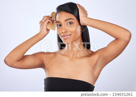 Woman comb hair, beauty and haircare cosmetics, keratin treatment and smile in portrait on studio background. Indian female grooming, straight hairstyle and skin glow, Brazilian and cosmetic care Woman comb hair, beauty and haircare cosmetics, keratin treatment and smile in portrait on studio background. Indian female grooming, straight hairstyle and skin glow, Brazilian and cosmetic care 134031261