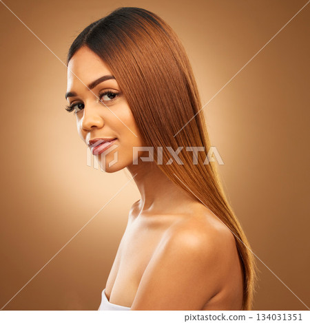 Brown hair, beauty and portrait of woman in studio for growth and color shine or healthy texture. Aesthetic female model for haircare, natural makeup and hairdresser or salon on gradient background 134031351