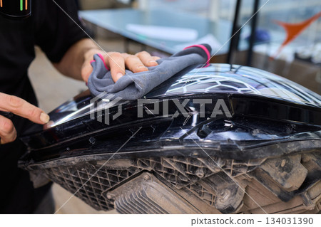 Applying a Protective Film on the Surface of Your Car for Enhanced Durability and Shine Applying a Protective Film on the Surface of Your Car for Enhanced Durability and Shine 134031390