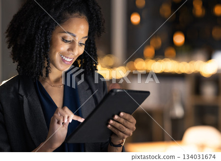 Night business, black woman and tablet planning, website research and online analytics, data and innovation in office. Young female entrepreneur, digital tech and internet strategy in dark startup 134031674