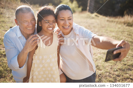 Selfie, phone and family in countryside for outdoor journey, travel or adventure together with mother, child and senior man. Happy family, Philippines and smartphone photography with kid for holiday 134031677