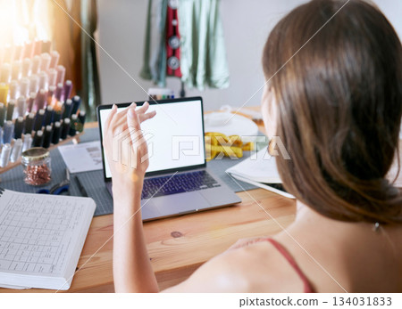Laptop, fashion and designer video call consulting with empty screen for expert communication. Creative, planning and virtual conversation with woman at design work desk in office with mock up. Laptop, fashion and designer video call consulting with empty screen for expert communication. Creative, planning and virtual conversation with woman at design work desk in office with mock up. 134031833