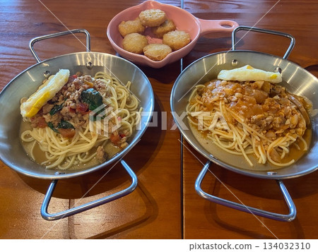Aerial view of pasta and chicken nuggets 134032310