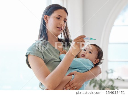 Mom, sick baby and thermometer for medical risk, assessment results and flu infection at home. Mother testing temperature of infant kid, child and check for fever, virus and worried about health Mom, sick baby and thermometer for medical risk, assessment results and flu infection at home. Mother testing temperature of infant kid, child and check for fever, virus and worried about health 134032451