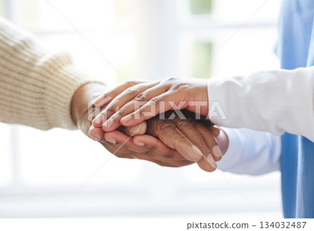 Holding hands, senior patient and nurse for support, healthcare or empathy at nursing home. Elderly person and caregiver together for trust, homecare and counseling or help for health in retirement Holding hands, senior patient and nurse for support, healthcare or empathy at nursing home. Elderly person and caregiver together for trust, homecare and counseling or help for health in retirement 134032487
