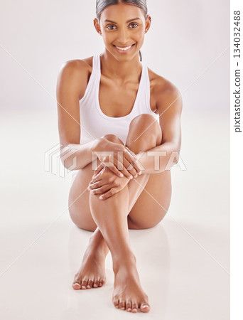 Woman in portrait, legs and feet with beauty and hands, hair removal with manicure and pedicure on studio background. Body, skincare spa treatment and female model with grooming and epilation Woman in portrait, legs and feet with beauty and hands, hair removal with manicure and pedicure on studio background. Body, skincare spa treatment and female model with grooming and epilation 134032488
