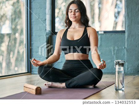 Yoga, lotus meditation and woman in gym for health, wellness and mindfulness exercise. Pilates, zen chakra and calm female yogi meditate for spiritual training, holistic workout or peace with incense 134032553