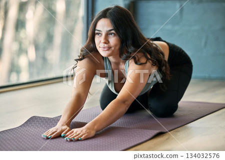 Yoga, child pose and woman stretching in gym for health, wellness or flexibility exercise. Pilates idea, thinking and young female yogi stretch, holistic training and workout for healthy fitness. Yoga, child pose and woman stretching in gym for health, wellness or flexibility exercise. Pilates idea, thinking and young female yogi stretch, holistic training and workout for healthy fitness. 134032576