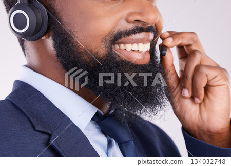 Call center, face and happy black man with microphone for crm questions, sales consulting and studio. Mouth, smile and male telemarketing consultant for contact, telecom and friendly customer support Call center, face and happy black man with microphone for crm questions, sales consulting and studio. Mouth, smile and male telemarketing consultant for contact, telecom and friendly customer support 134032748