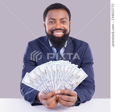 Portrait, cash and investment with a business black man in studio on a gray background as a lottery winner. Money, accounting and finance with a male employee holding dollar bills for the economy Portrait, cash and investment with a business black man in studio on a gray background as a lottery winner. Money, accounting and finance with a male employee holding dollar bills for the economy 134032772