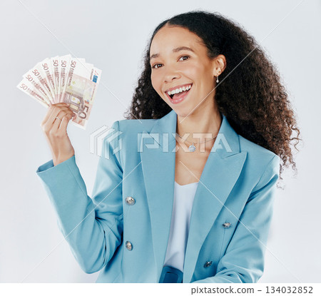 Portrait, happy and cash with a business woman in studio on a gray background making a perfect hand gesture. Smile, finance and money with a female employee holding euro bills for investment Portrait, happy and cash with a business woman in studio on a gray background making a perfect hand gesture. Smile, finance and money with a female employee holding euro bills for investment 134032852