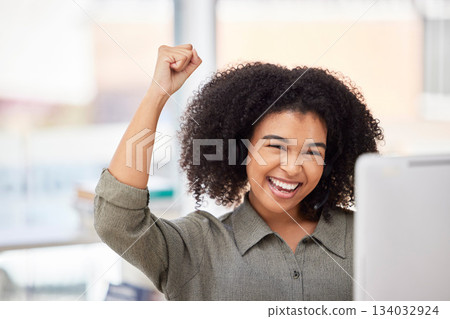 Black woman success celebration on computer in office, happy and excited for winning deal, sales or profit. Good news of businesswoman or female winner with fist pump or yes on desktop pc for target Black woman success celebration on computer in office, happy and excited for winning deal, sales or profit. Good news of businesswoman or female winner with fist pump or yes on desktop pc for target 134032924