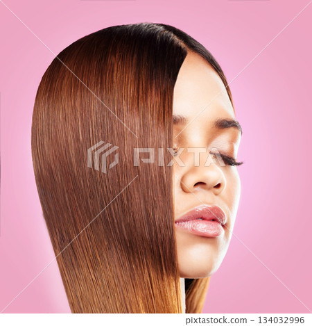 Beauty, hair and face of black woman with eyes closed isolated in studio with pink background for salon advertising. Haircare, straightener and Brazilian hairstyle on model for growth product promo. Beauty, hair and face of black woman with eyes closed isolated in studio with pink background for salon advertising. Haircare, straightener and Brazilian hairstyle on model for growth product promo. 134032996
