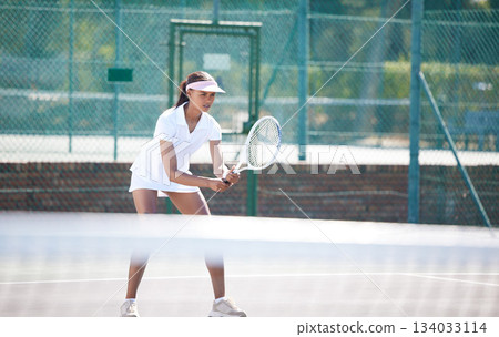 Tennis fitness, outdoor match and woman hit a sports ball with a racket on a exercise court. Sport game, workout competition and young female doing cardio action for wellness and health in summer Tennis fitness, outdoor match and woman hit a sports ball with a racket on a exercise court. Sport game, workout competition and young female doing cardio action for wellness and health in summer 134033114
