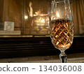 Glasses of champagne and a fireplace 134036008