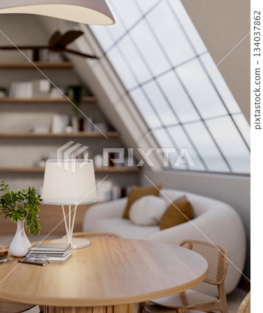 Book with coffee and lamp on round wooden table with chair next to sofa under roof window in attic. Book with coffee and lamp on round wooden table with chair next to sofa under roof window in attic. 134037862