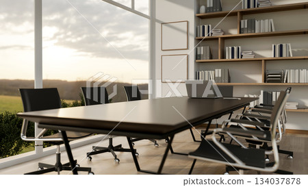 A laptop on black table with swivel chairs in the office with wide glass wall. Meeting room setup. 134037878