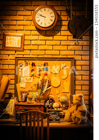 A warm scene with a teddy bear surrounded by Christmas goods A warm scene with a teddy bear surrounded by Christmas goods 134038555