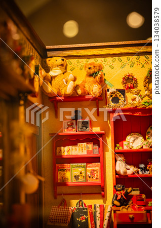 A warm scene with a teddy bear surrounded by Christmas goods A warm scene with a teddy bear surrounded by Christmas goods 134038579