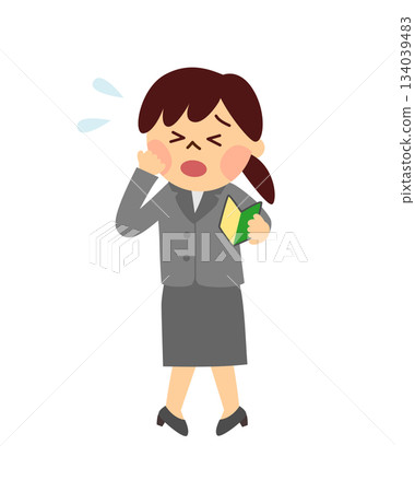 An anxious woman holding a beginner's mark 134039483