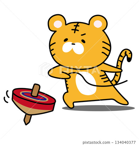 Tiger playing with a spinning top Tiger playing with a spinning top 134040377