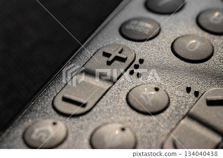Close view of a remote control with numbers and buttons. High quality photo 134040438