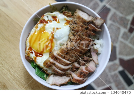 Pork rice with fried egg and vegetables Pork rice with fried egg and vegetables 134040470