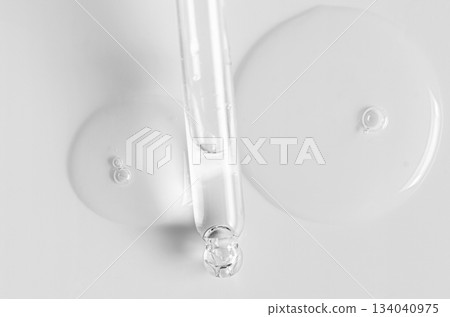 Transparent cosmetic product. Face serum or cleanser gel or body moisturizing gel. Transparent cosmetic product. Face serum or cleanser gel or body moisturizing gel. 134040975