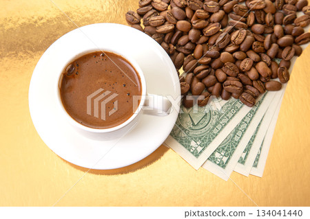 The photograph highlights a white cup of Turkish coffee with beans The photograph highlights a white cup of Turkish coffee with beans 134041440