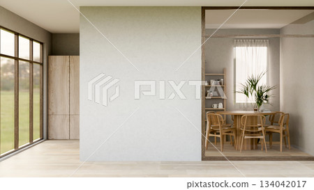An empty white wall between wooden floor corridor and a dining room with a set of table and chairs. An empty white wall between wooden floor corridor and a dining room with a set of table and chairs. 134042017