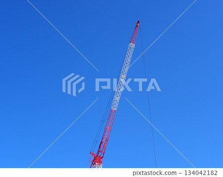 Blue sky and crane lifting materials Copy space Blue sky and crane lifting materials Copy space 134042182