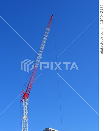 Blue sky and crane lifting materials Copy space Blue sky and crane lifting materials Copy space 134042183