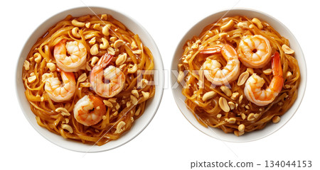 Stir-fried shrimp Pad Thai with crushed peanuts and rice noodles, isolated on white background, concept of Thai cuisine 134044153