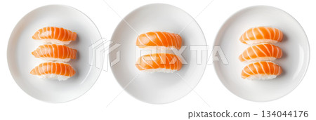 Salmon nigiri sushi arranged neatly on white plate, isolated on white background, concept of Japanese cuisine 134044176