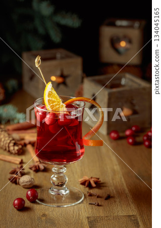 Christmas drink with spices, orange, and cranberries. Christmas drink with spices, orange, and cranberries. 134045165