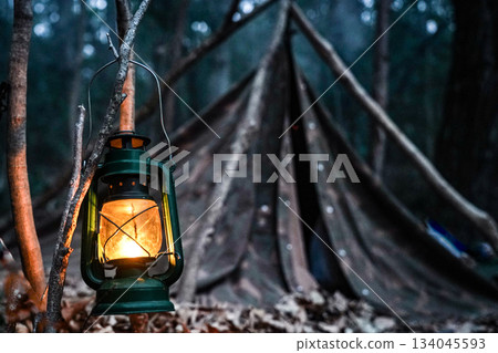 Military tent and lantern 134045593