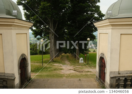 Historic Garden Gateway Leading To Woodland Path 134046056
