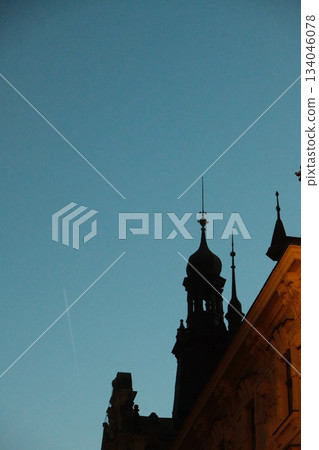 Gothic Spire Silhouette Against Evening Sky 134046078