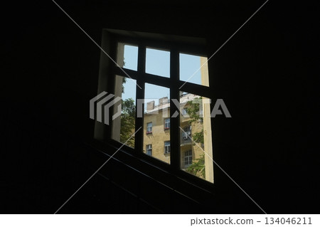 Urban View Through Geometric Window Frame Urban View Through Geometric Window Frame 134046211