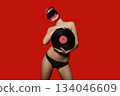 beauty woman portrait in lingerie with vinyl disc 134046609